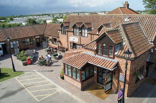 An ariel photo of the Barn Inn, Coffee Shop and Arcade Complex